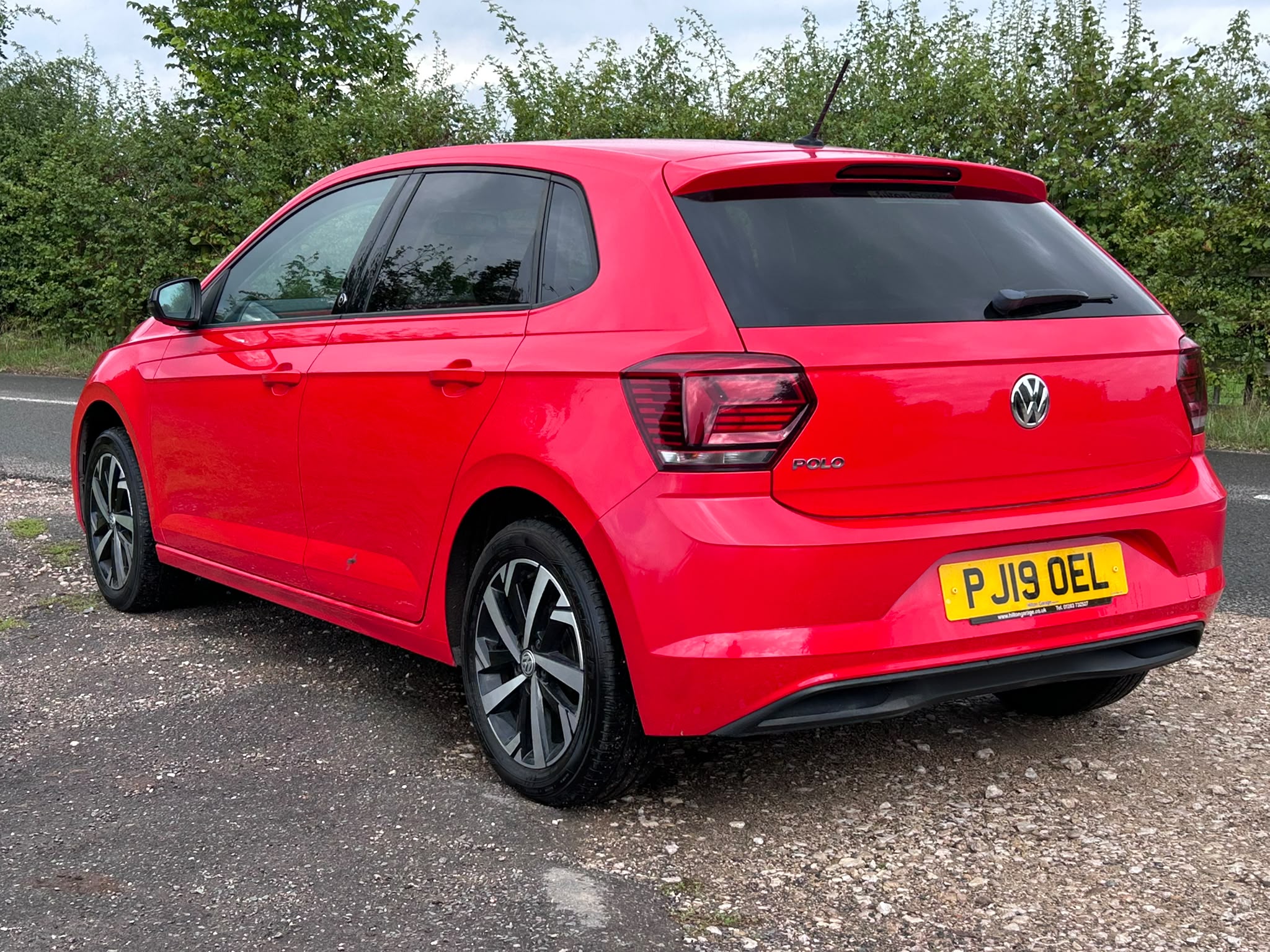 2019 Volkswagen Polo Beats Flash Red - rear three-quarter view