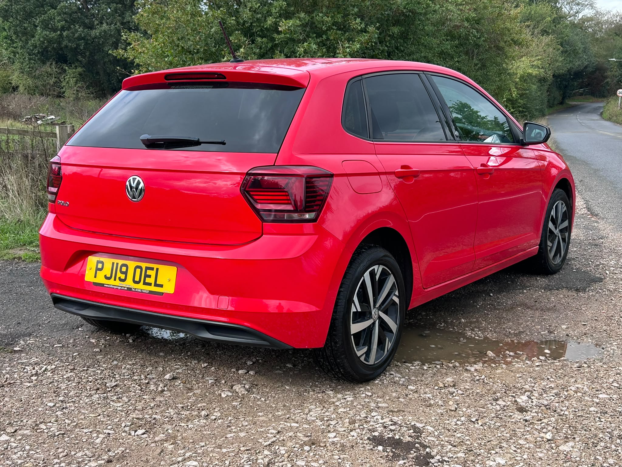 2019 Volkswagen Polo Beats Flash Red - opposite rear three-quarter view