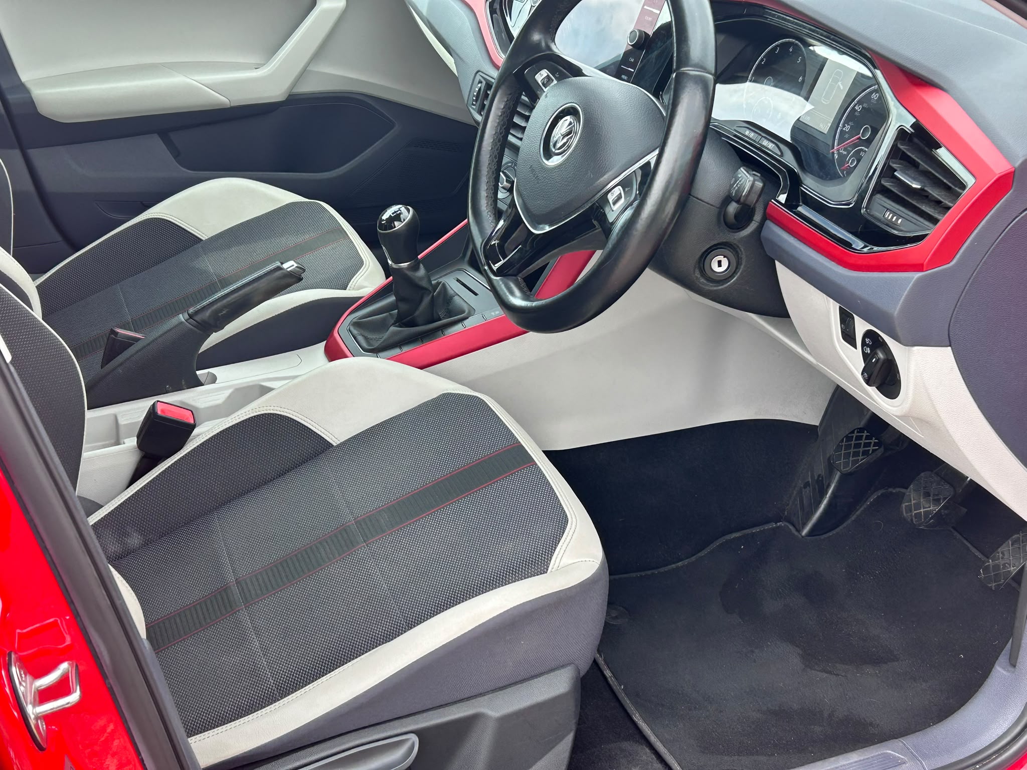 2019 Volkswagen Polo Beats Flash Red - front seats and dashboard